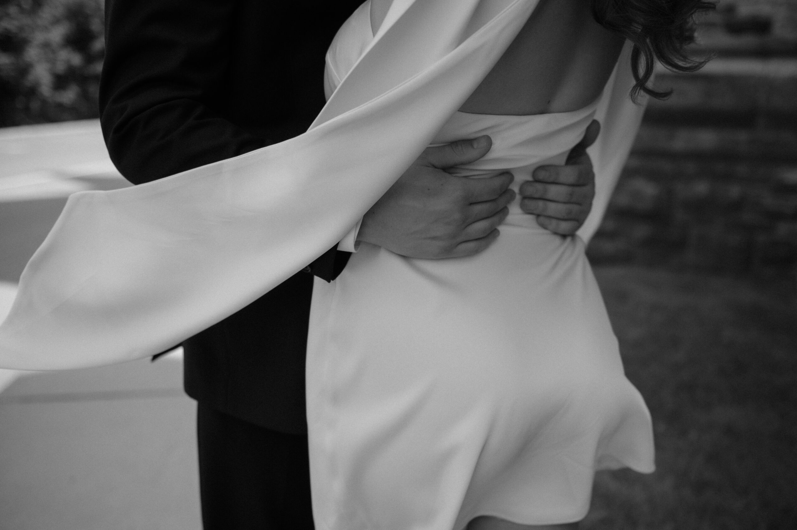 Elegant portrait of a couple near Parliament buildings during a downtown Ottawa engagement shoot.